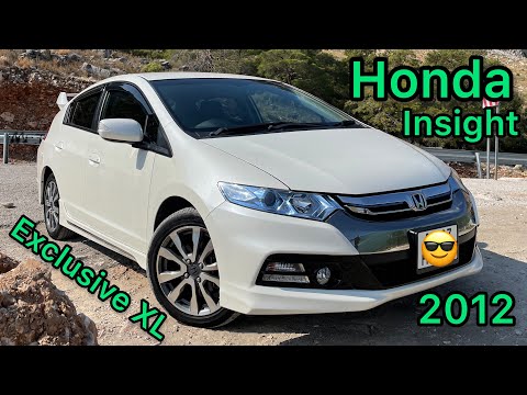 Видео: Обзор Honda insight 2012 Exclusive XL
