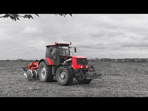 Видео: трактором МТЗ 3022 Беларус с навесной дисковой мелиоративной бороной БДН-30М