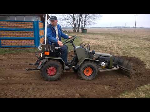 Видео: МТЗ 132 с отвалом