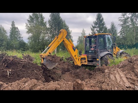 Видео: Корчуем и захораниваем пни экскаватором LiuGong 777A-S. Благоустройство и планировка участка.