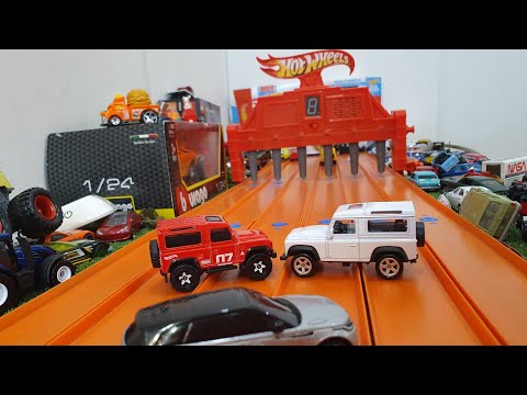 Видео: Что лучше? Land Rover или Range Rover. Обзор и сравнение Welly и Hot Wheels