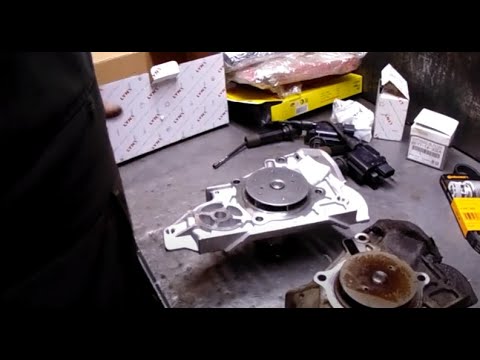 Видео: Mazda Familia 323 ЗАМЕНА ПОМПЫ/САЛЬНИКОВ РАСПРЕДВАЛОВ /ЗАМЕНА РЕМЕНЯ ГРМ @МеханикПетрович