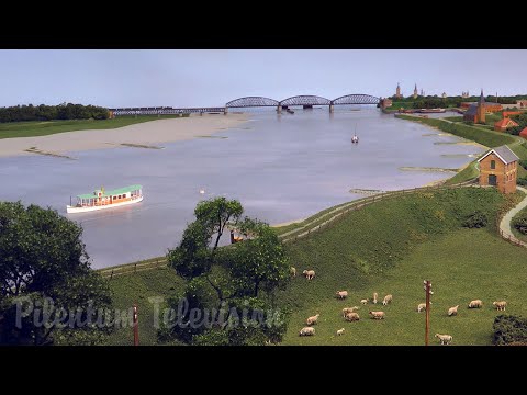 Видео: Удивительная модель железной дороги: Оптическая иллюзия вынужденной перспективы