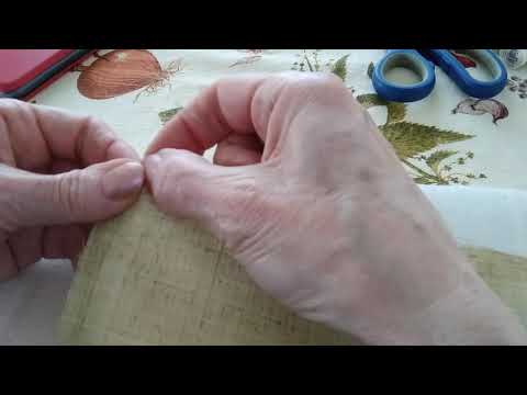 Видео: Как сделать уголок в платке ручным швом