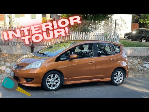 Видео: Обзор и экскурсия по салону Honda Fit 2009 года