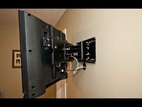 Видео: Установка кронштейна. Вешаем телевизор на стену.