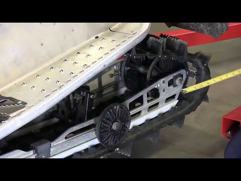 Видео: Технические советы от AMSOIL, регулировка гусениц снегохода