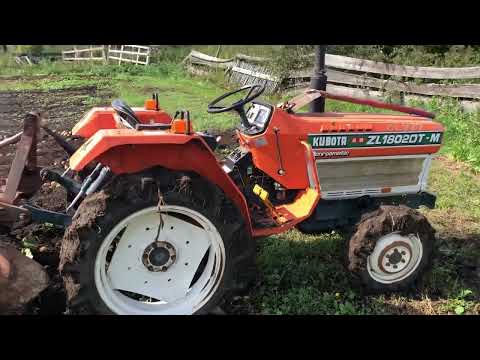 Видео: Японский минитрактор копает картошку