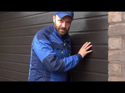 Видео: Установка гаражных секционных ворот ALUTECH Prestige