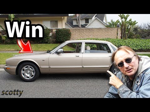 Видео: Отдай этому Jaguar XJ8 и почему он лучший автомобиль для езды в Нью-Йорке