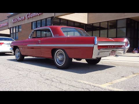 Видео: Pontiac Catalina Royal Bob Cat Treatment 1962 года, 421 CI V8 4-ступенчатая, красная. Моя история...