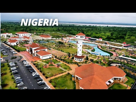 Видео: Самые роскошные районы Асабы, Нигерия