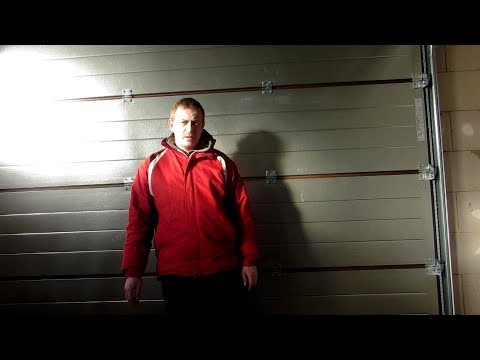 Видео: Монтаж секционных ворот