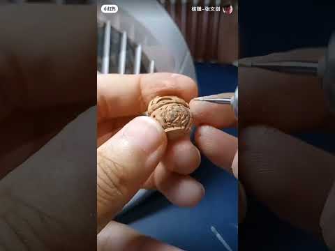 Видео: Поделки из косточки от персика. Сувенир из косточки.