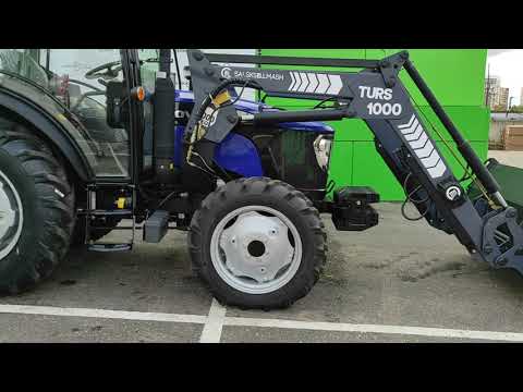 Видео: Трактор LOVOL 804 с фронтальным погрузчиком TURS 1000: обзор работы и характеристики