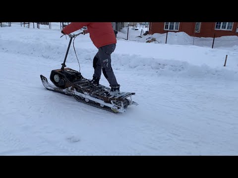 Видео: Снегокат