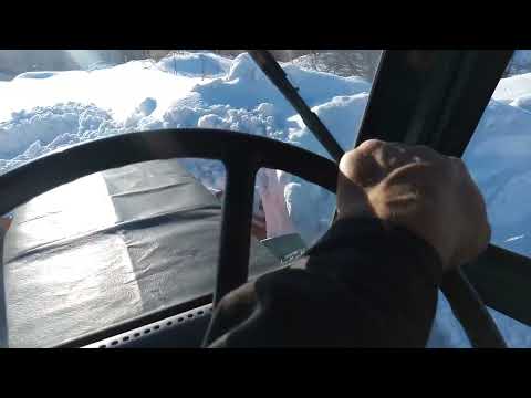 Видео: Чистим дороги от снега на Т 40