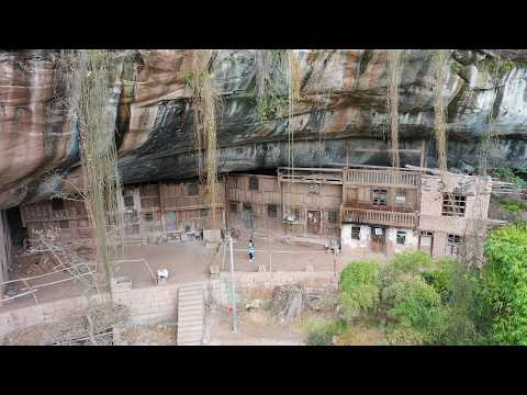 Видео: Пещерные люди Хубэй жили здесь в уединении сотни лет.