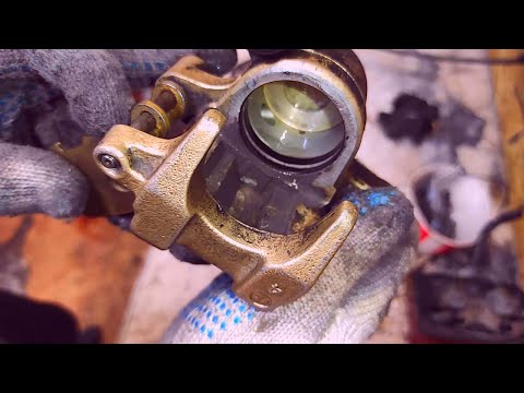 Видео: Восстановление тормозного суппорта Honda 400