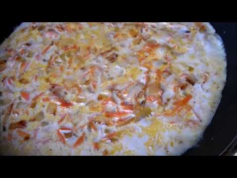 Видео: Кальмары в сметанном соусе. Простой способ приготовления сытного блюда, а главное - быстро.