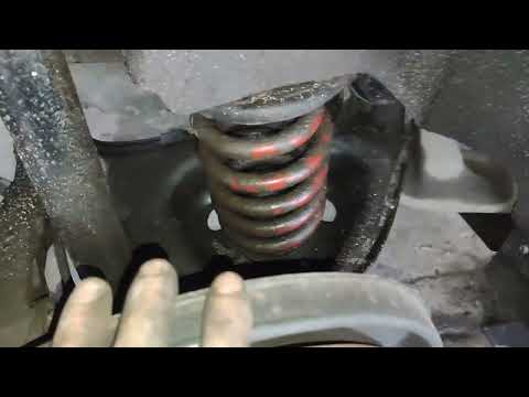 Видео: Заміна задніх пружин Audi A6 C6