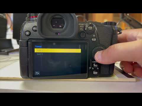 Видео: Panasonic G9: как обновить прошивку