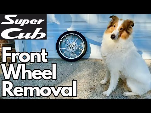 Видео: Honda Super Cub C125 — Как снять и установить переднее колесо