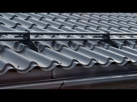 Видео: Устанавливаем снегозадержатели на крышу частного дома