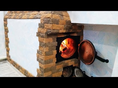 Видео: 🔥 Облицовка печи декоративным камнем
