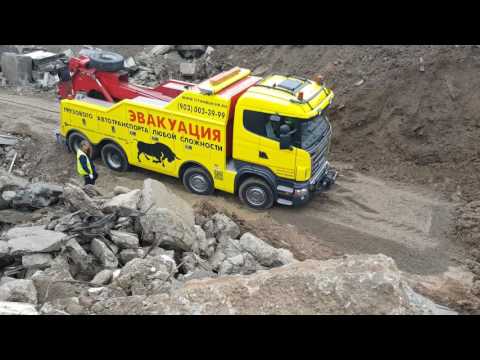 Видео: Подъем упавшего экскаватора