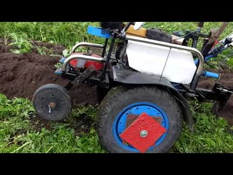 Видео: Осенние хлопоты. Вспашка,Нарезка гребней,Посадка-лука,чеснока,моркови.