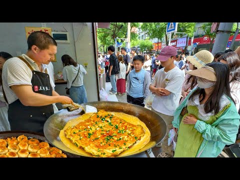 Видео: Внутри местных рынков Уханя, Китай: чистота, вкус и атмосфера настоящей уличной еды и жизни