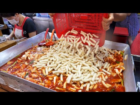 Видео: 150 кг в день! Аппетитный острый рисовый пирог! Самые популярные корейские уличные закуски