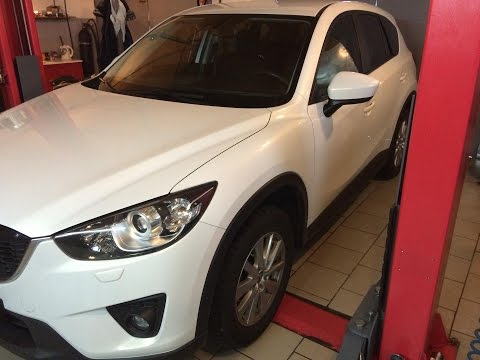 Видео: Как поменять масло Mazda CX5