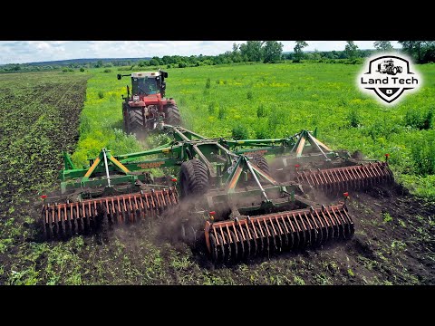 Видео: Трактор Ростсельмаш 2375 и AMAZONE Catros - работа по заросшему полю!