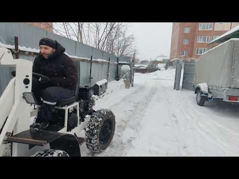 Видео: Испытание полноповоротного мини погрузчика.