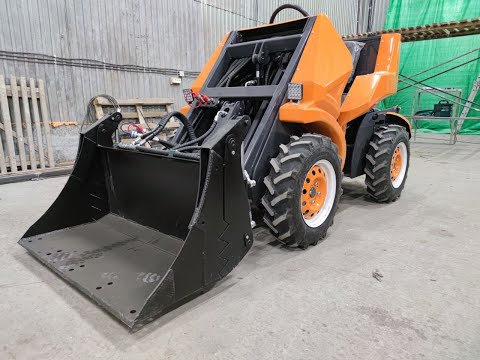 Видео: Мини погрузчик / мини трактор НАНУК серия z. Уборка снега