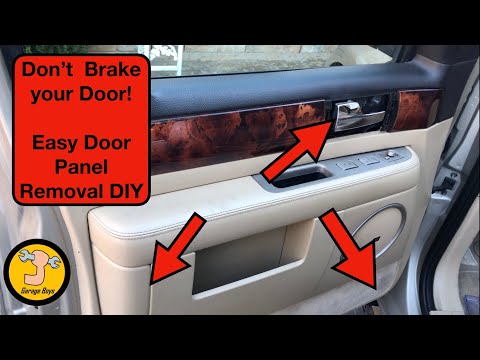 Видео: Снятие дверной панели Lincoln Navigator 02-06