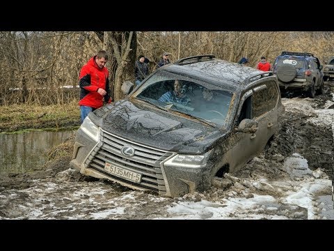 Видео: Что может LEXUS LX против JEEP WRANGLER, TOYOTA PRADO и FJ CRUISER на бездорожье.