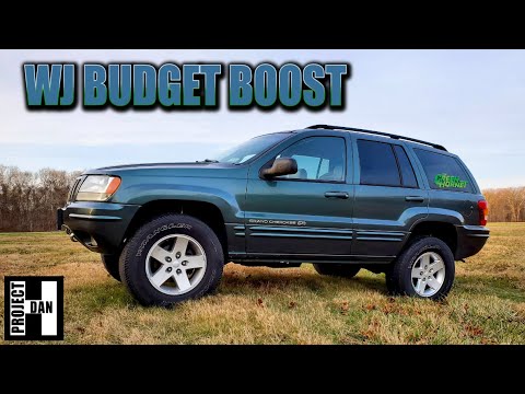 Видео: JEEP GRAND CHEROKEE 2-3 ДЮЙМА ROUGH COUNTRY BUDGET BOOST - 2002 WJ LIFT