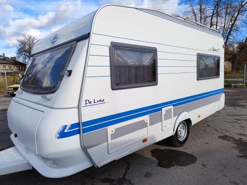 Видео: Обзор немецкого автодома прицепа-дачи HOBBY 2002 года 4 места с палаткой и бойлером 750 кг