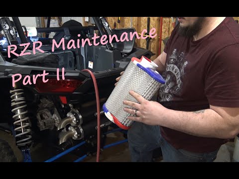 Видео: Техническое обслуживание вашего RZR (часть 2): воздушный фильтр, свечи зажигания, подшипник ступи...