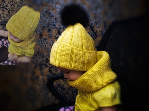 Видео: Шапочка на ребёнка спицами. Вязание спицами. Мастер класс