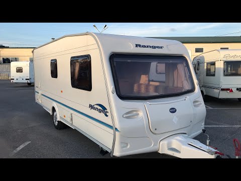 Видео: Обзор прицепа дачи.Bailey Ranger 550/6. Год 2004. Шести местный. Цена 550 тысяч.