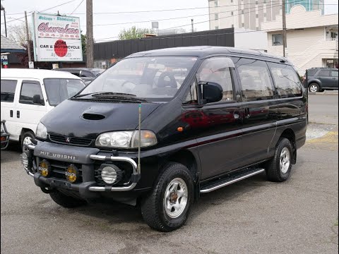 Видео: 1996 Mitsubish Delica Space Gear Long t-diesel 4X4 13,500km (по-русски)