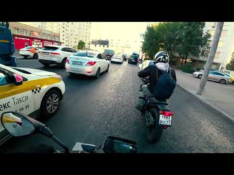 Видео: Мотоинструктор в городе с учеником