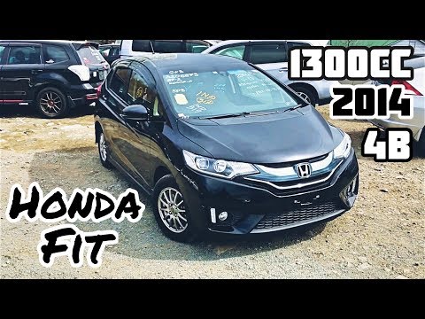 Видео: Обзор Honda Fit 2014 г. 1300сс.С авторынка Зелёный Угол!