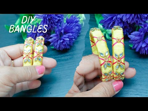 Видео: Браслеты из жёлтых шёлковых ниток. Как сделать браслеты дома?