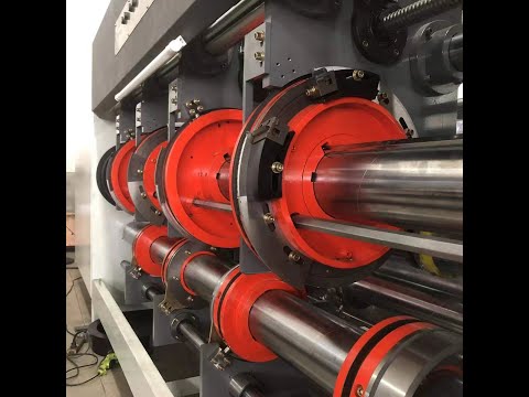 Видео: Слоттер (просекательно-рилевочный станок) для четырехклапанных ящиков из гофрокартона. Модель ASM