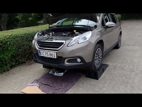 Видео: Очередная замена масла и фильтра Пежо 2008